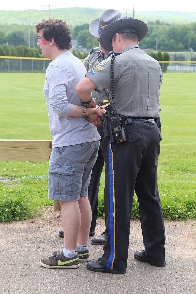 IMG_2019.JPG - After determaining that this party is above the legal limit, the Troopers arrest him for the appropriate charges
